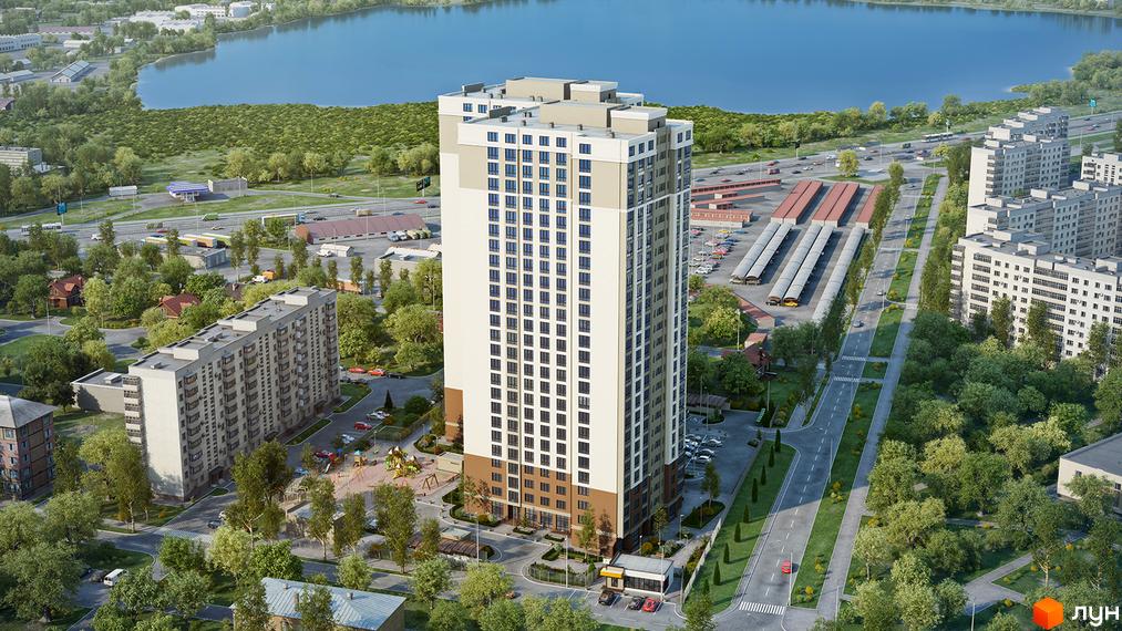 Вид на висотний житловий комплекс з фасадом з білої та бежевої плитки, що має багато вікон. Навколо комплексу розташовані зелені насадження, дитячий майданчик та парковка.