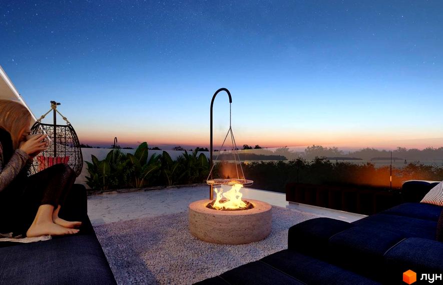 Таунхауси Montreux: затишна тераса з каміном та зоною відпочинку на заході сонця. Насолоджуйтесь вечірнім небом та природою.