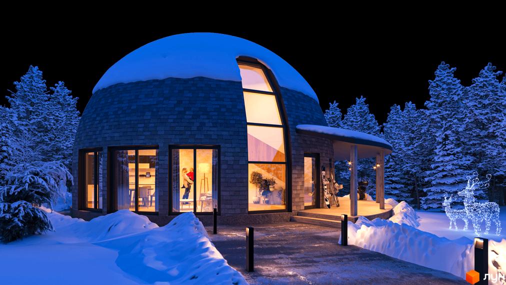 Котеджне містечко КМ Сфера Кетер взимку з купольною архітектурою та снігом на даху. Навколо будинку засніжені дерева та святкова ілюмінація у вигляді оленів.