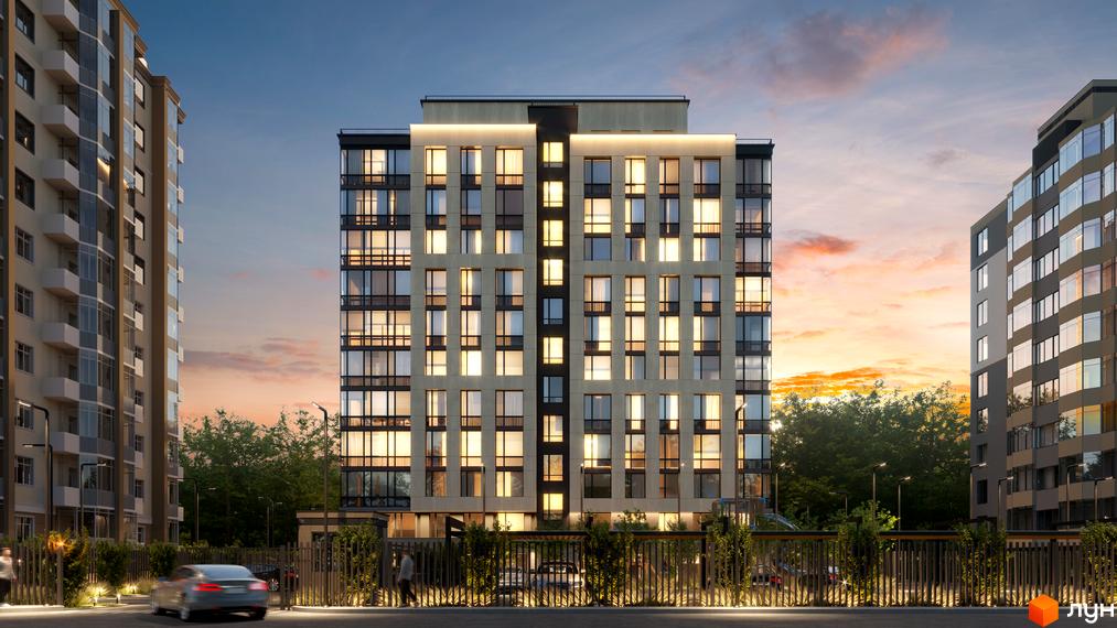 Зовнішній вигляд будинку ЖК Еталон з великою кількістю вікон та балконів, освітлених ввечері. На прибудинковій території видно дерева та огорожу.