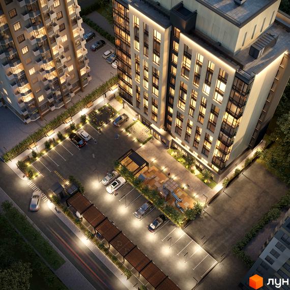 Житловий комплекс Еталон з фасадом, що світиться, та прибудинковою територією з парковкою та дитячим майданчиком.