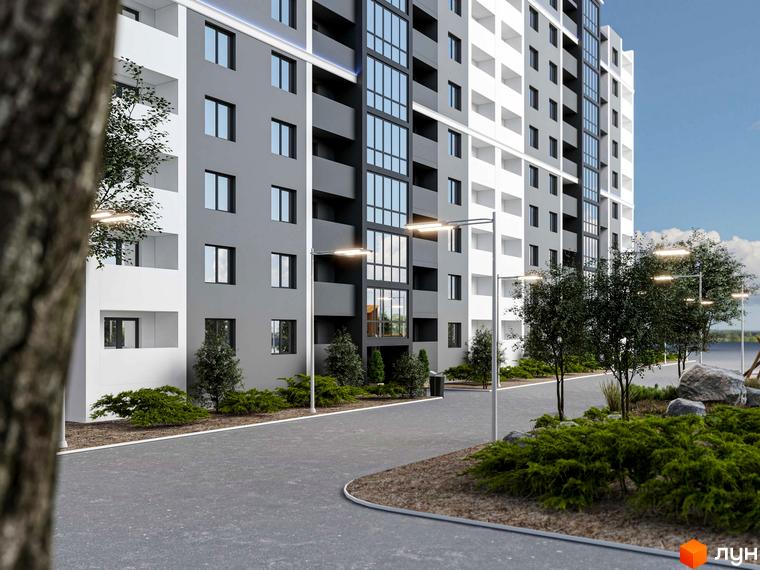 Зображення фасаду та прибудинкової території Житлового комплексу Північний. На передньому плані тротуар, зелені насадження та дерева.