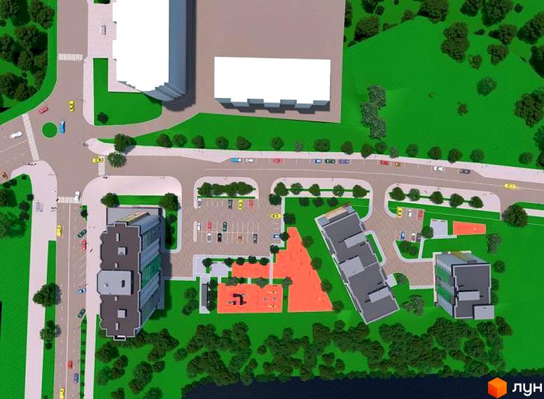 Вид зверху на житловий комплекс Гетьманський з багатоквартирними будинками та дитячим майданчиком. Навколо комплексу зелені насадження та паркувальні місця.