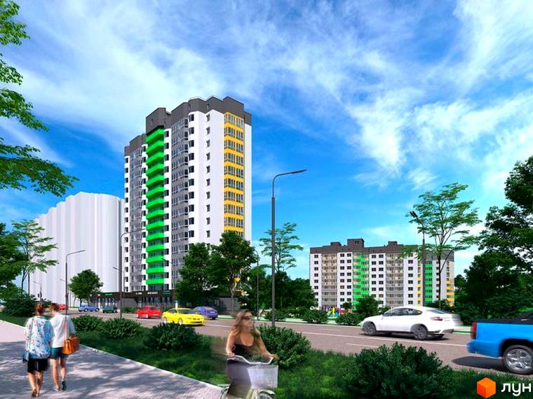 Житловий комплекс Гетьманський з яскравими зеленими та жовтими фасадами, розташований біля дороги з автомобілями та пішохідною зоною.