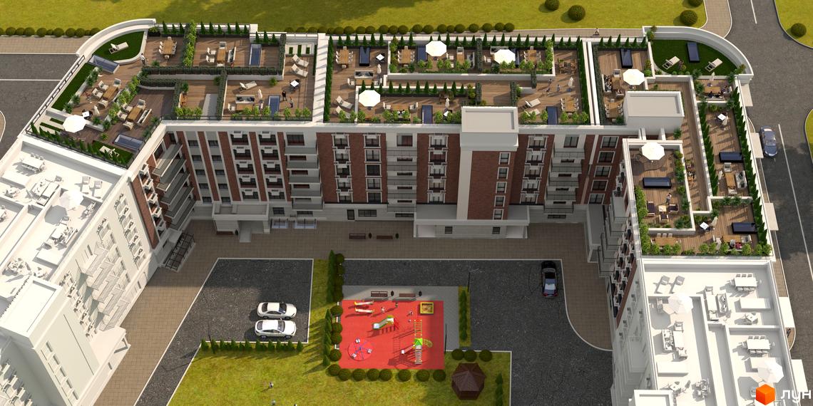 Житловий комплекс Єлецький: вид зверху на будівлю з терасами та прибудинкову територію з дитячим майданчиком та парковкою.