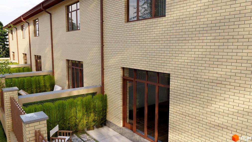 Зовнішній вигляд таунхаусів Vygovskii Village з цегляним фасадом та зеленими насадженнями. Огляд прибудинкової території з парканом та місцями для відпочинку.