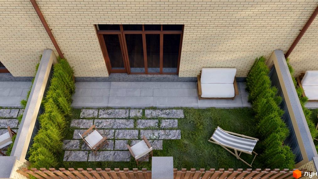 Таунхаус Vygovskii Village з цегляним фасадом та зеленою прибудинковою територією з місцями для відпочинку. Огляд двору з меблями та рослинністю.