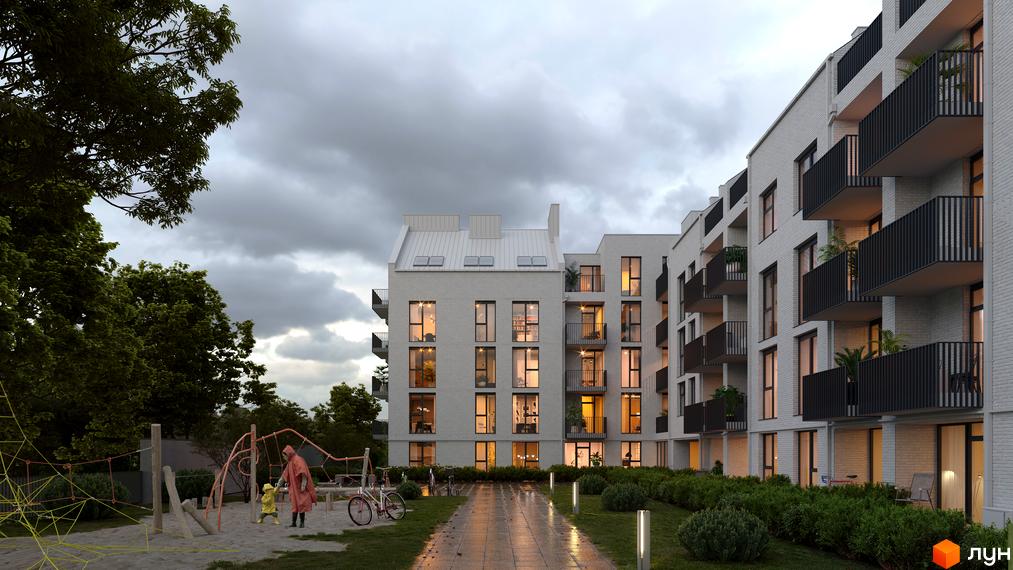 Зовнішній вигляд новобудови ЖК FEEL HOUSE з цегляним фасадом та балконами. Прибудинкова територія з дитячим майданчиком та зеленими насадженнями.