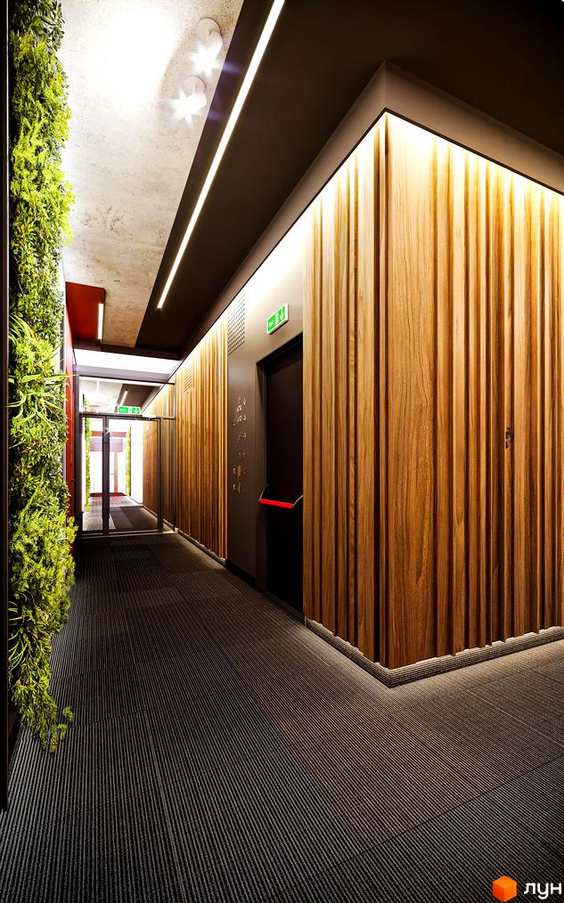 Інтер'єр коридору в Житловому комплексі Life Story з дерев'яними панелями на стінах та зеленою стіною з рослин.