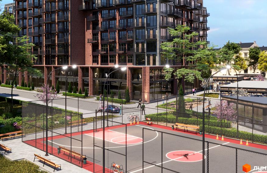 Висотна будівля житлового комплексу з балконами та великими вікнами. На території комплексу розташований спортивний майданчик та зелені насадження.