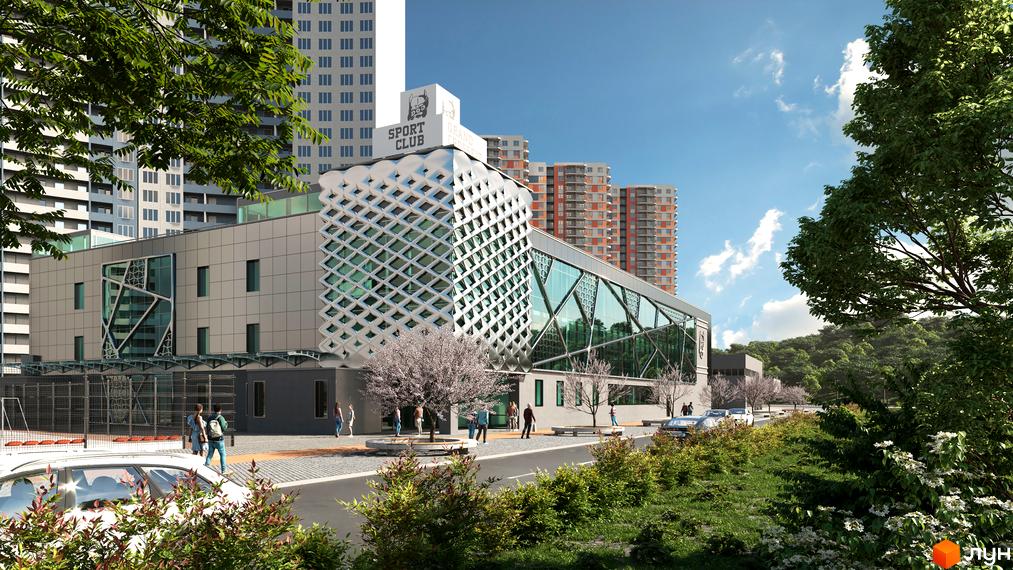 Новобудова Orange City з оригінальним фасадом та скляними елементами. Навколо комплексу зелена зона з деревами та місцями для відпочинку.