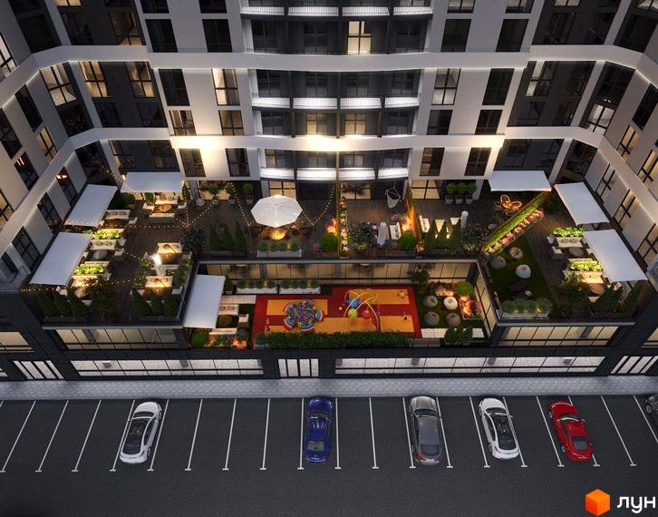 Вид зверху на Будівельний проєкт GRAND HALL з паркінгом та облаштованою прибудинковою територією з дитячим майданчиком та зонами відпочинку.