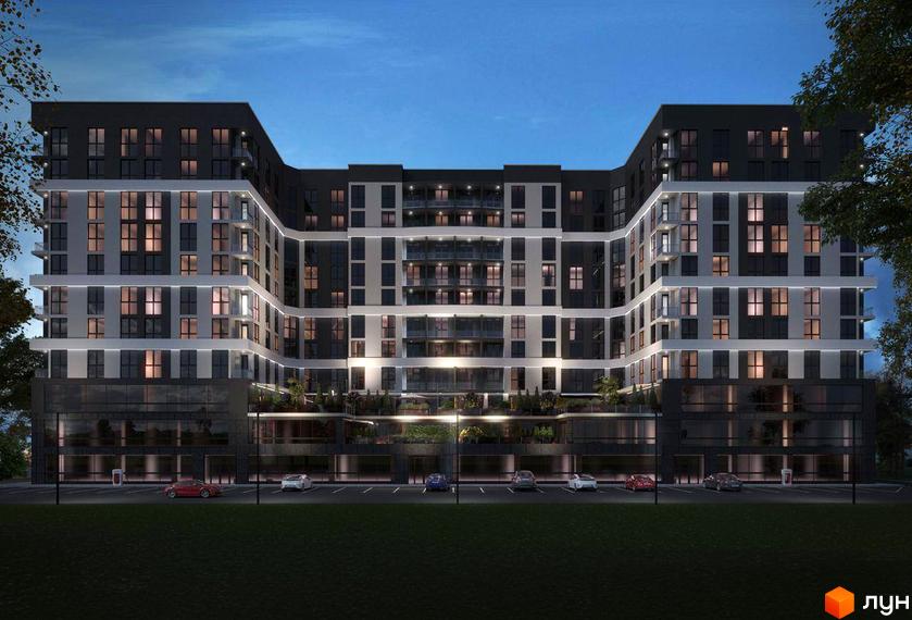 Фасад житлового комплексу GRAND HALL з численними вікнами та балконами, що виходять на парковку з автомобілями. Будинок має багатоповерхову, хвилясту форму.