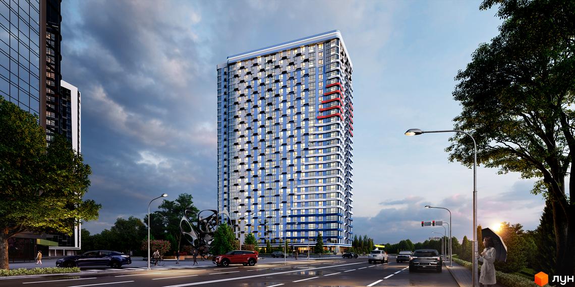 Високоповерховий житловий комплекс Берег Дніпра з блакитними та білими фасадами та червоними акцентами. Навколо комплексу зелені дерева та міська вулиця з автомобілями.