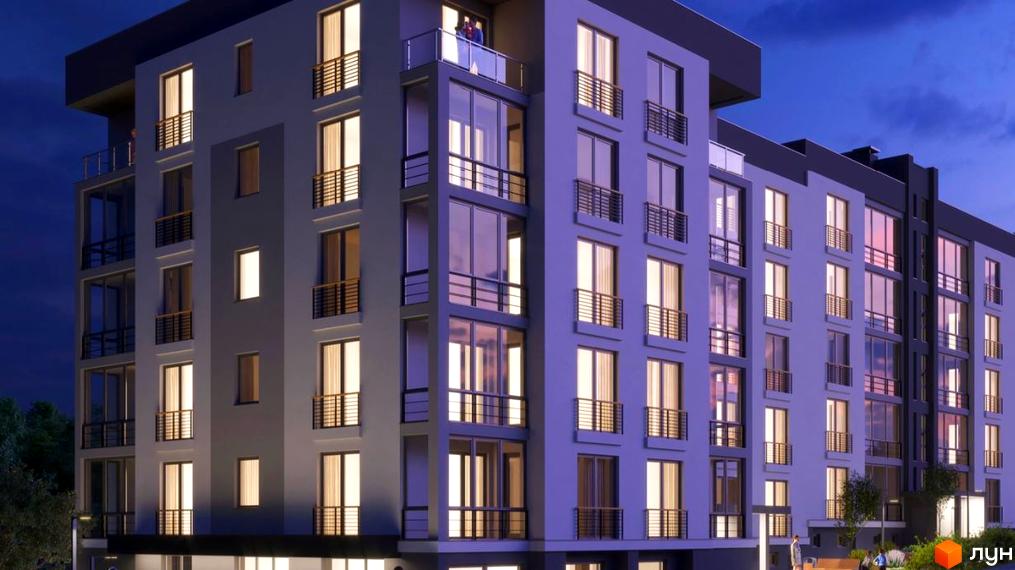 Новобудова ЖК Baker Street у вечірній час. Багатоповерховий будинок з великими вікнами та балконами, освітлений зсередини. Біля будинку видно дерева та освітлення території.