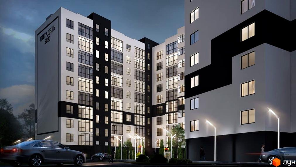 Житловий комплекс Цитадель-3. Сучасна архітектура з контрастними чорно-білими фасадами, великими вікнами та освітленою прибудинковою територією з автомобілями.