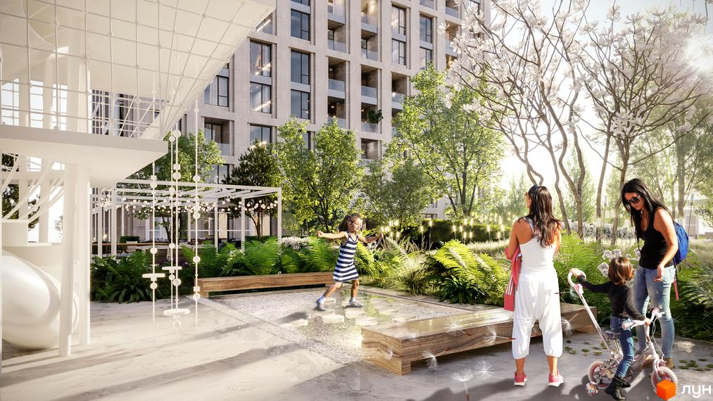 Doma Trabotti: багатоповерховий будинок з великими вікнами та зеленою прибудинковою територією з дитячим майданчиком.