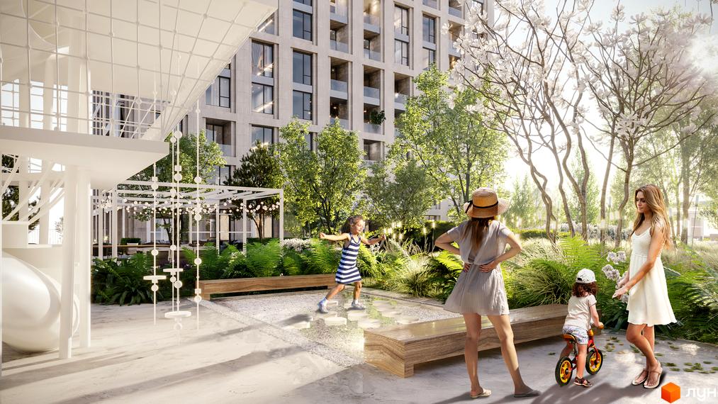 Doma Trabotti: комплекс з кам'яним фасадом та дитячим майданчиком. Затишна прибудинкова територія з деревами та зонами відпочинку.