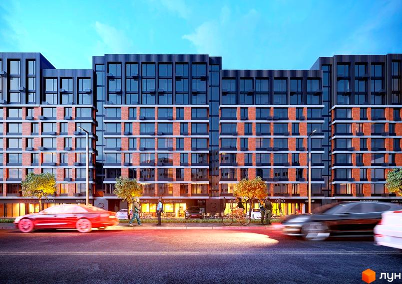 Зовнішній вигляд новобудови ЖК Євромісто 2 з цегляним фасадом та великими вікнами. Перед будинком розташована вулиця з автомобілями та пішоходами.