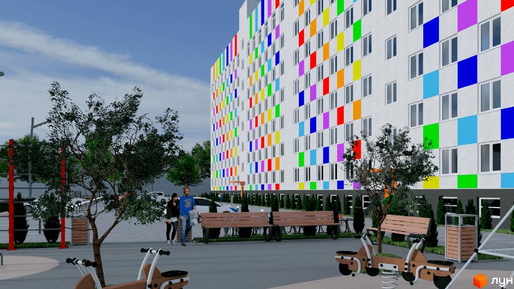 Будинок Житлового комплексу Воробйовi гори PRO з білим фасадом та кольоровими вставками. Прибудинкова територія з деревами, лавками та тренажерами.