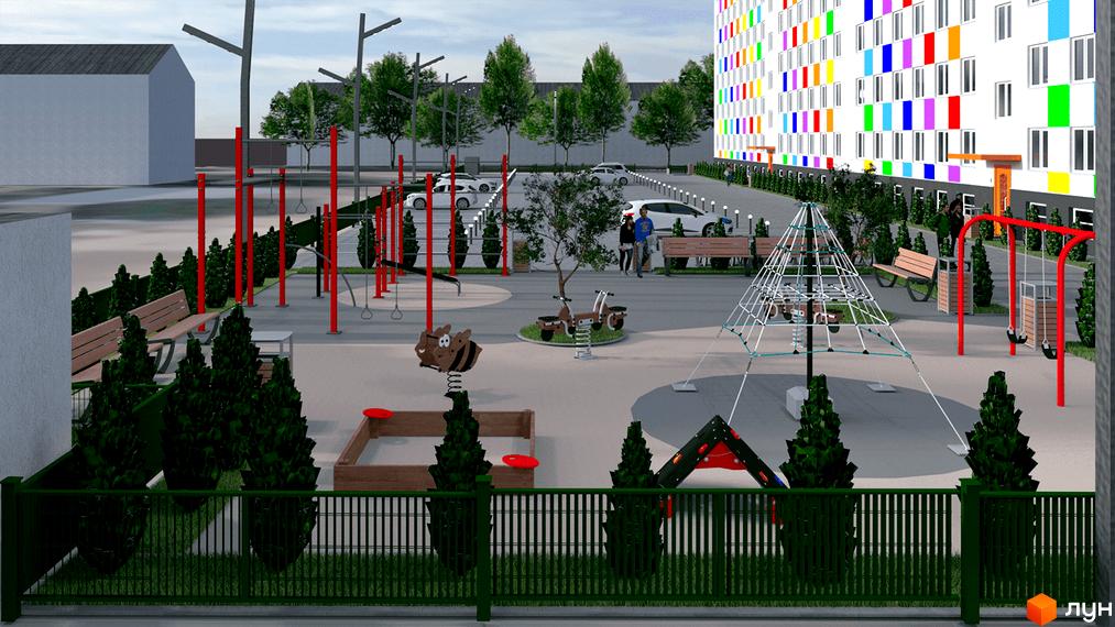 Житловий комплекс Воробйовi гори PRO з яскравим фасадом та облаштованим дитячим майданчиком з гойдалками та пісочницею.