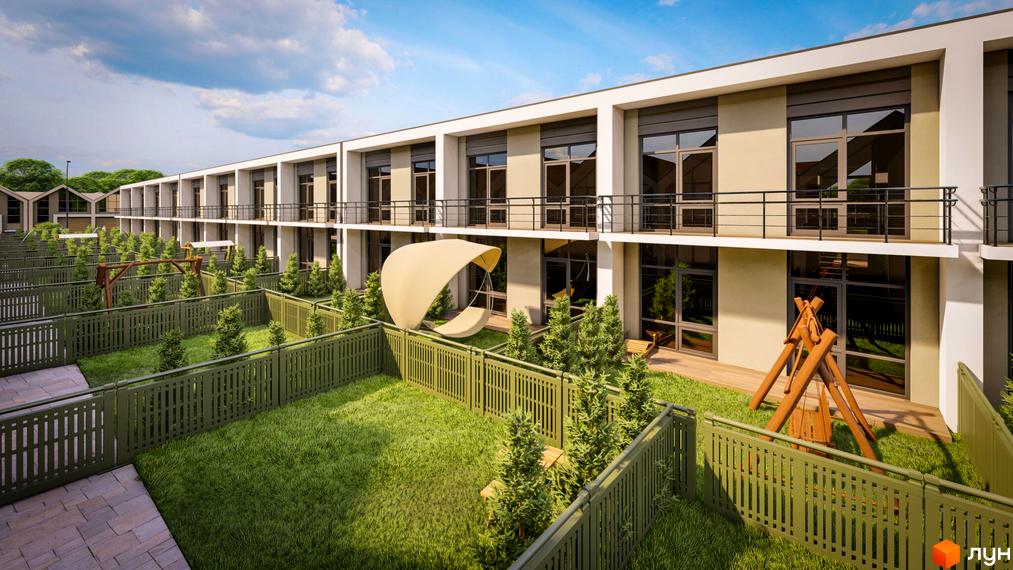 Двоповерховий будинок з великими вікнами та балконами. На прибудинковій території є зелені газони, дерева та дитячий майданчик.