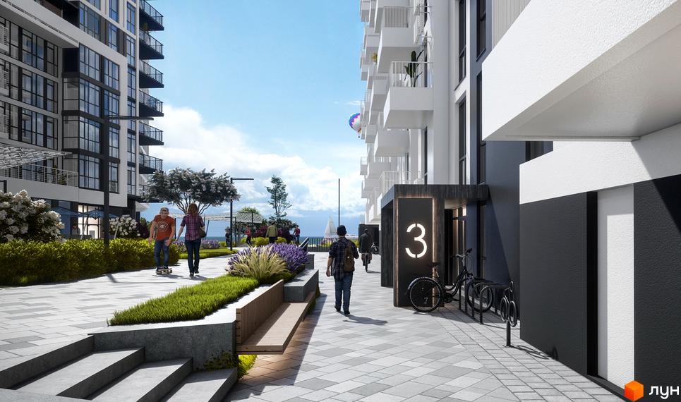 Зображення фасаду та прибудинкової території Житлового комплексу Kokos Avenue. Вигляд пішохідної алеї з лавками та озелененням.