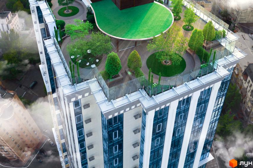 Висотна будівля ЖК Royal Tower з панорамними вікнами та зеленим дахом. На даху розташовані газони, дерева та зони відпочинку.