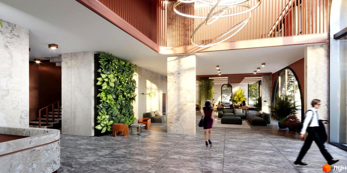 Інтер'єр холу ЖК на вул. Болсуновська, 16 з великими вікнами, рослинами та елементами дизайну у світлих тонах. Вид на вхідну зону.