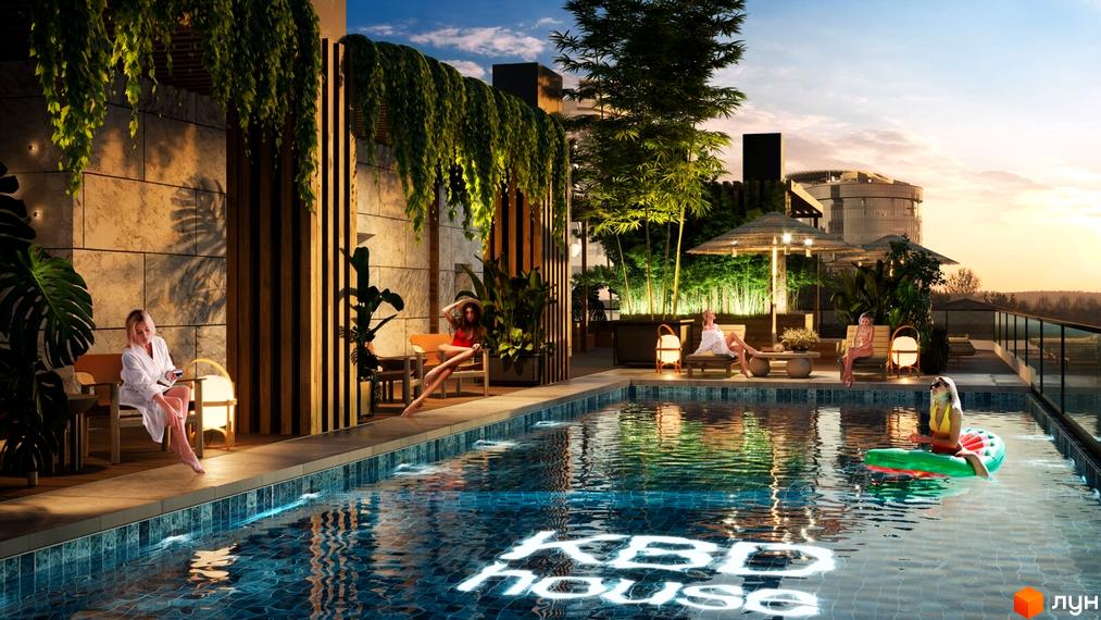 Житловий комплекс з басейном на даху з видом на місто. На території комплексу є місця для відпочинку та зелені насадження.