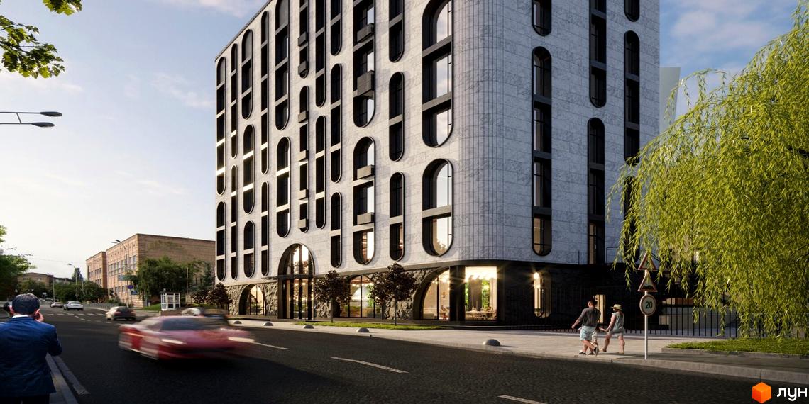 Житловий комплекс з фасадом у світлих тонах з великими вікнами-арками. На тротуарі біля будинку стоять люди, поруч росте дерево.