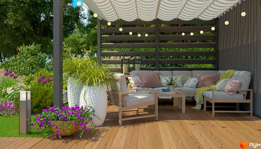 Тераса Котеджного містечка Gardd House Eco Village з дерев'яним настилом та меблями. Прилегла територія має зелений сад з квітами.