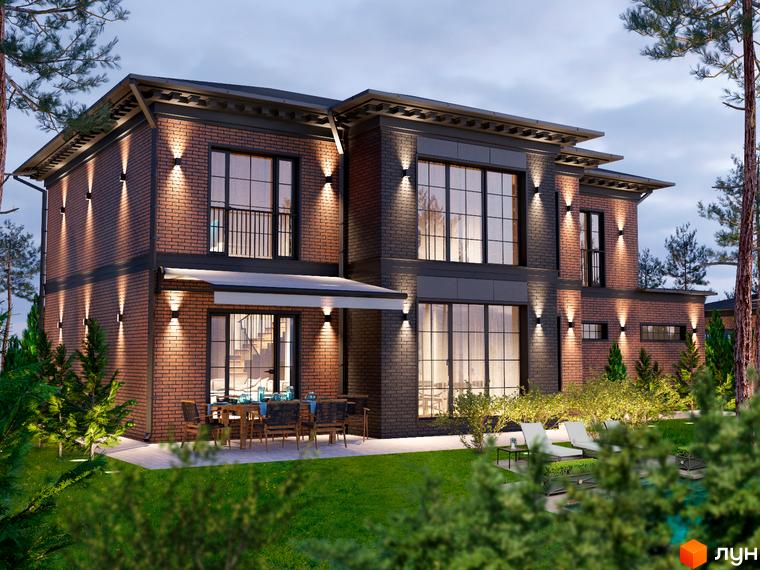 Котеджне містечко КМ LakeWood 2 - двоповерховий будинок з червоної цегли та сірого каменю з великими вікнами та терасою. Навколо будинку зелена галявина, дерева та зона відпочинку з шезлонгами.