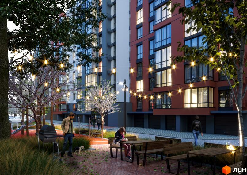 Фасади Житлового комплексу Молодіжний у червоному та сірому кольорах з великими вікнами. Двір освітлений гірляндами, облаштований лавками та зоною барбекю.