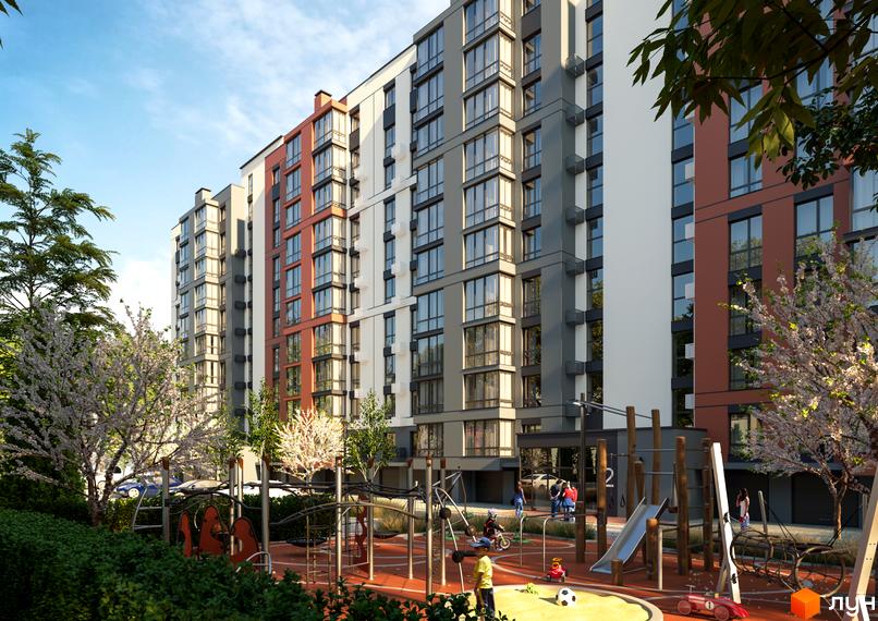 Житловий комплекс Молодіжний: багатоповерховий будинок з білими, сірими та теракотовими фасадами, поруч дитячий майданчик з ігровими елементами та зеленими насадженнями.