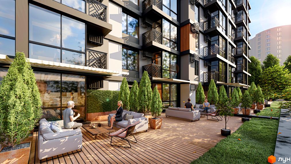 Житловий комплекс Atmosphere з терасами та зоною відпочинку. На території комплексу висаджені дерева та кущі, є місця для відпочинку.