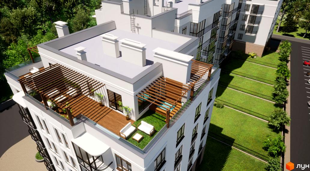 Клубний квартал Феофанія-park: вид зверху на будівлю з терасами та зеленим газоном. Навколо будівлі розташовані дерева та парковка.