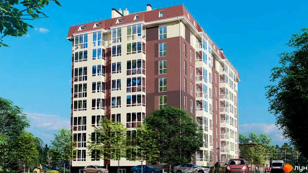 Багатоповерховий житловий комплекс з бежево-коричневим фасадом та червоним дахом. Навколо будинку зелені дерева та припарковані автомобілі.