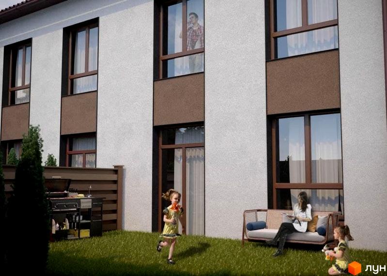 Фасад таунхаусів Green Heaven світлого кольору з коричневими вікнами. На зеленій прибудинковій території відпочивають люди.