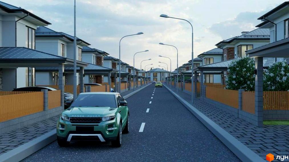 Котеджне містечко КМ NOVYI SVIT: ряд сучасних будинків з навісами для авто та огородженою територією. Асфальтована дорога з розміткою та вуличним освітленням.