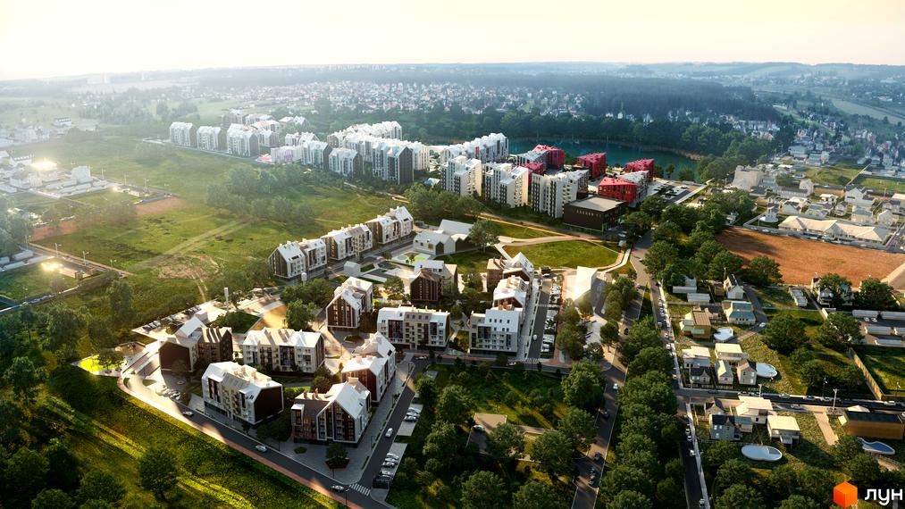 Аерофото Житлового комплексу City Lake з багатоповерховими будинками та таунхаусами серед зелених насаджень та озера.