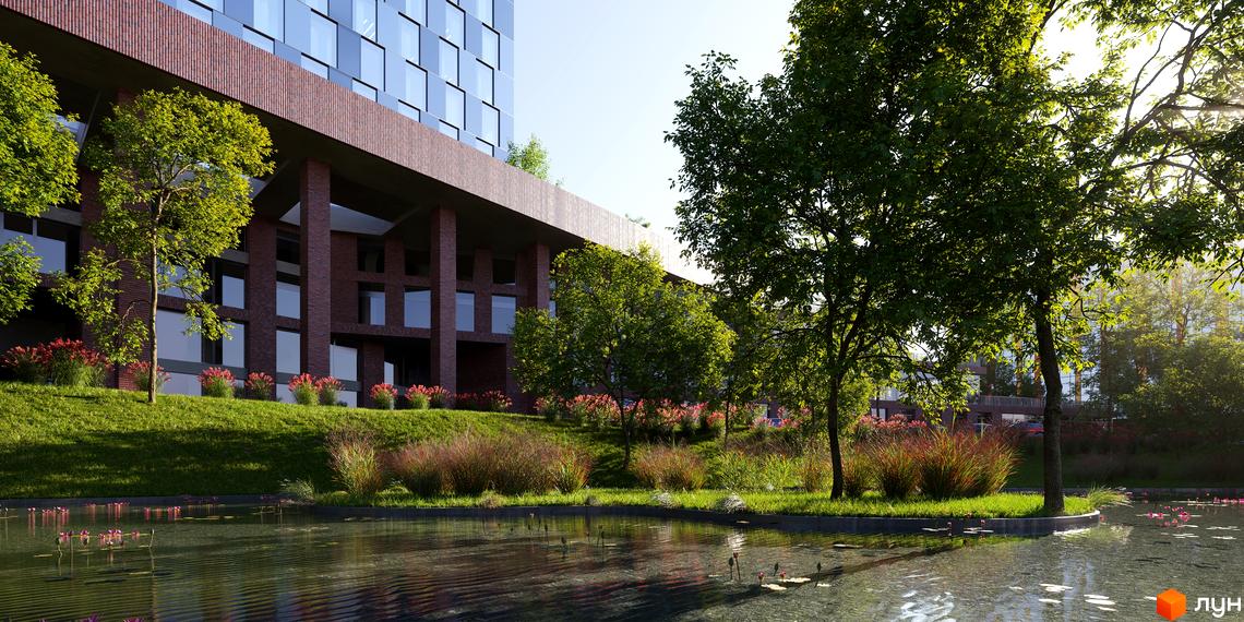 БФК MAYAK: фасади з цегли та скла, прибудинкова територія з озелененням та водоймою.