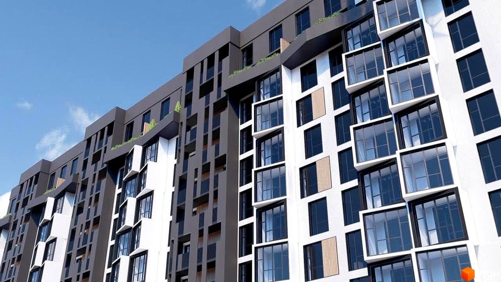 Зовнішній вигляд новобудови ЖК Argo з білими та темними фасадами, великими вікнами та балконами. Будівельний проєкт розташований на фоні блакитного неба.