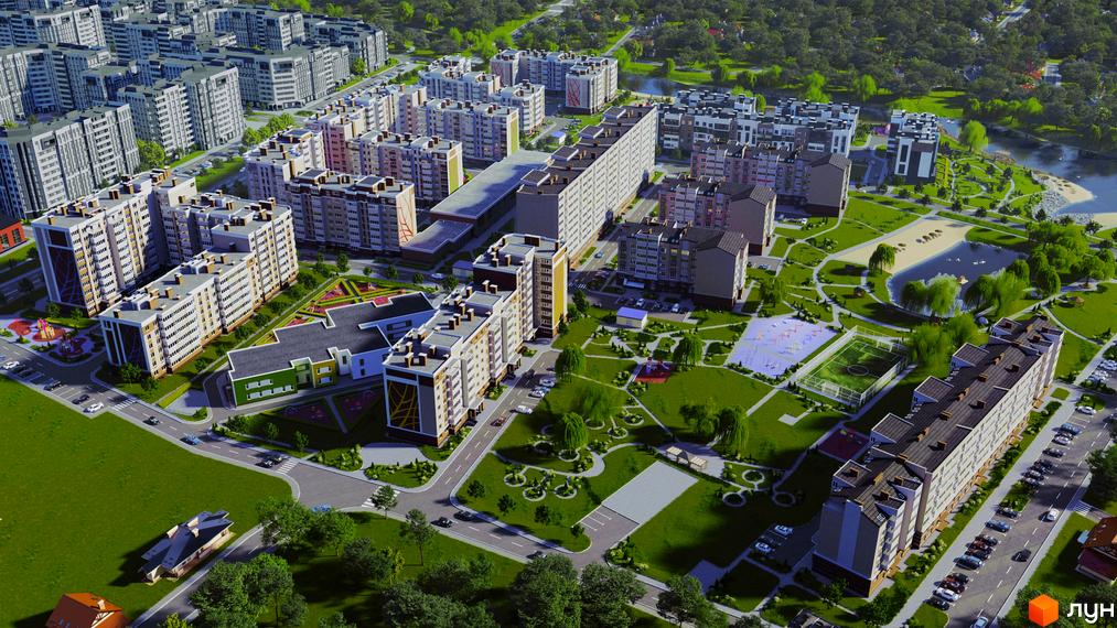 Новобудова Озерний Гай (Гатне) з багатоповерховими житловими будинками світлих відтінків, оточена зеленими парками, озером та інфраструктурою.