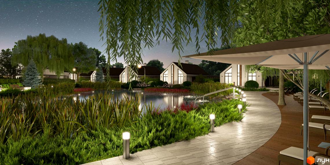 Білі будинки Котеджного містечка Gardd House Eco Village з великими вікнами. Територія облаштована ставком, освітленими доріжками та густою зеленню.