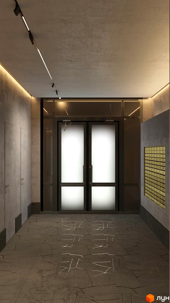 Сучасний вхід у житловий комплекс Голосіївський з подвійними скляними дверима та поштовими скриньками на стіні.