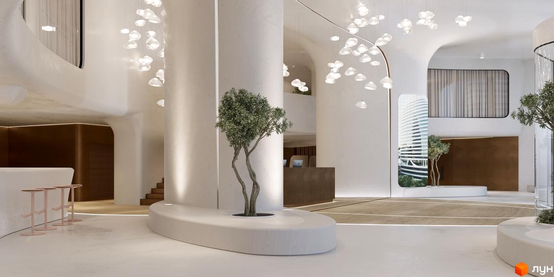 Фасад Багатофункціонального комплексу INTERGAL CITY з вигнутими лініями, що проглядається крізь вікно. Просторе лобі з органічними формами та деревами.