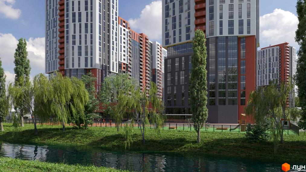 Житловий комплекс BonAparte з фасадами біло-сірого кольору та червоними акцентами, розташований біля водойми з доглянутою зеленою прибудинковою територією та дитячим майданчиком.