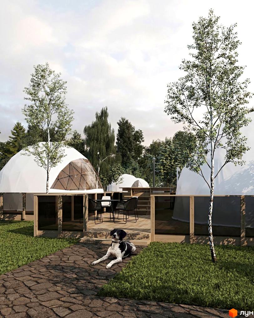 КМ Lakeville: купольні будинки та зона відпочинку з навісом, оточені зеленню та деревами. Прибудинкова територія з доріжкою з бруківки та газоном.