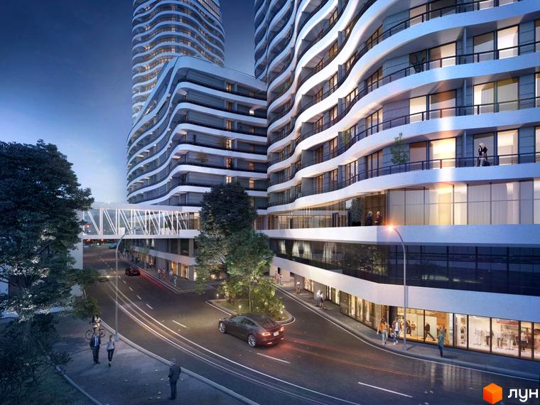 Житловий комплекс Unity Towers: високі будівлі з хвилястими фасадами та балконами. Навколо дорога, зелені насадження та комерційні приміщення на перших поверхах.